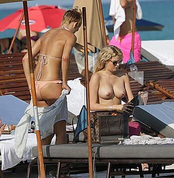 Shayna Terese Taylor and Kristen Nicole topless on a beach