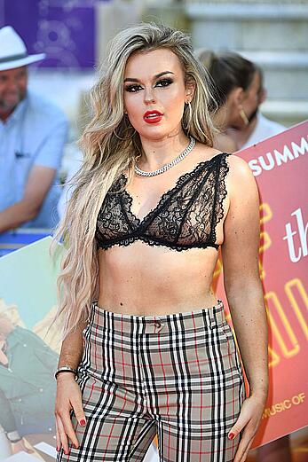 Tallia Storm in sheer bra attends the Off The Rails World premiere at Odeon Luxe Leicester Square in London
