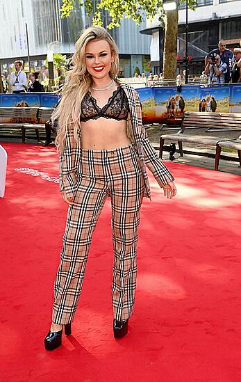 Tallia Storm in sheer bra attends the Off The Rails World premiere at Odeon Luxe Leicester Square in London