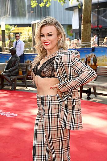 Tallia Storm in sheer bra attends the Off The Rails World premiere at Odeon Luxe Leicester Square in London