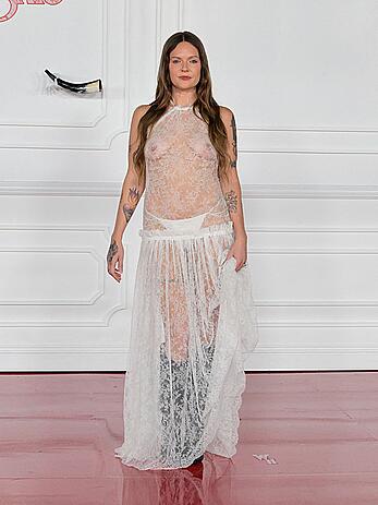 Tove Lo braless in sheer dress at Wuthering Heights premiere in LA