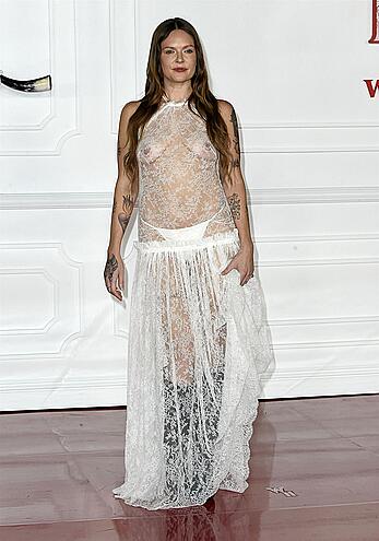 Tove Lo braless in sheer dress at Wuthering Heights premiere in LA