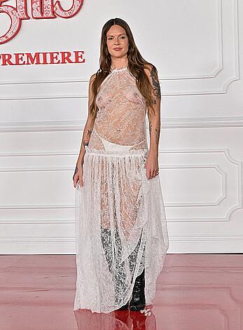 Tove Lo braless in sheer dress at Wuthering Heights premiere in LA