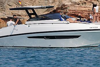 Wanda Nara tit slip in a swimsuit on the boat ride in the scenic waters of Ibiza