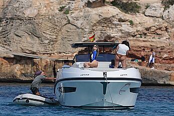Wanda Nara tit slip in a swimsuit on the boat ride in the scenic waters of Ibiza