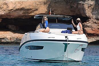 Wanda Nara tit slip in a swimsuit on the boat ride in the scenic waters of Ibiza