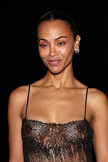 Zoe Saldana braless in sheer dress at Saint Laurent Womenswear Spring∕Summer 2027 show at Paris Fashion Week - September 29, 2026