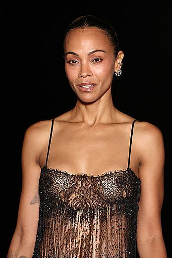 Zoe Saldana braless in sheer dress at Saint Laurent Womenswear Spring∕Summer 2027 show at Paris Fashion Week - September 29, 2026