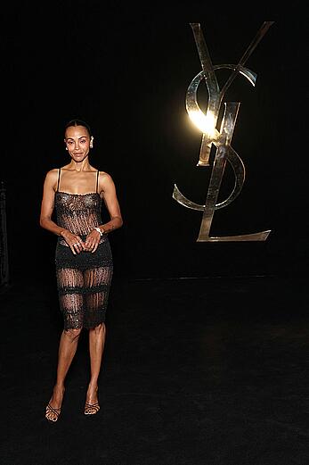Zoe Saldana braless in sheer dress at Saint Laurent Womenswear Spring∕Summer 2027 show at Paris Fashion Week - September 29, 2026