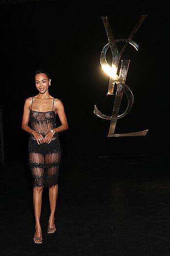 Zoe Saldana braless in sheer dress at Saint Laurent Womenswear Spring∕Summer 2027 show at Paris Fashion Week - September 29, 2026