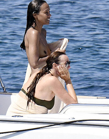 Zoe Saldana topless on a yacht in Italy