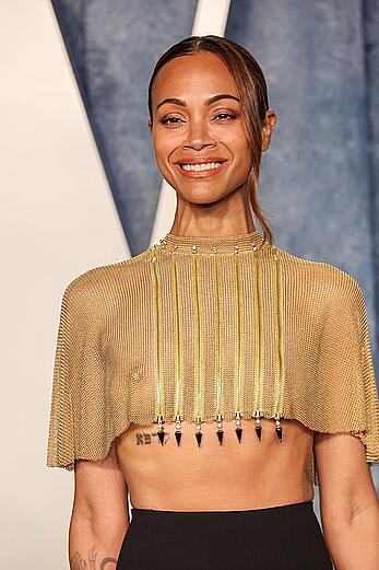 Zoe Saldana see through to nipples at Vanity Fair Oscar Party in Beverly Hills