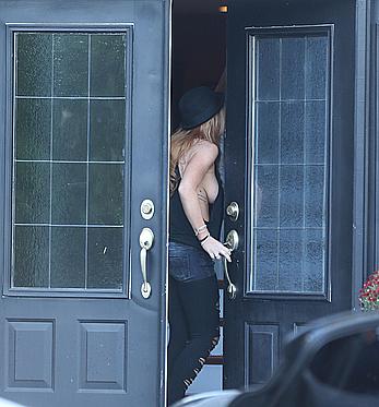 Lindsay Lohan out braless in a loose shirt visit her Mom