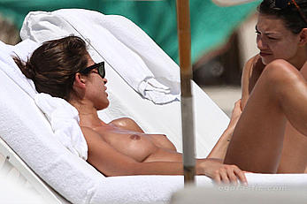 Supermodel Yaya Kosikova caught topless on the beach in Miami