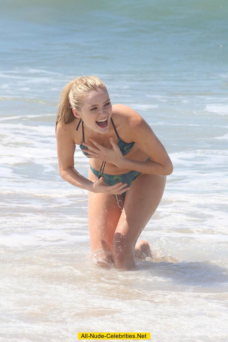 Greer Grammer sexy in bikini on a beach.