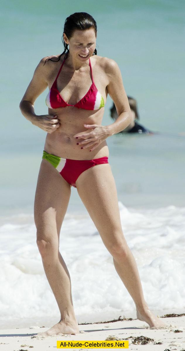 Minnie Driver sexy in bikini candids in Carribean beach.